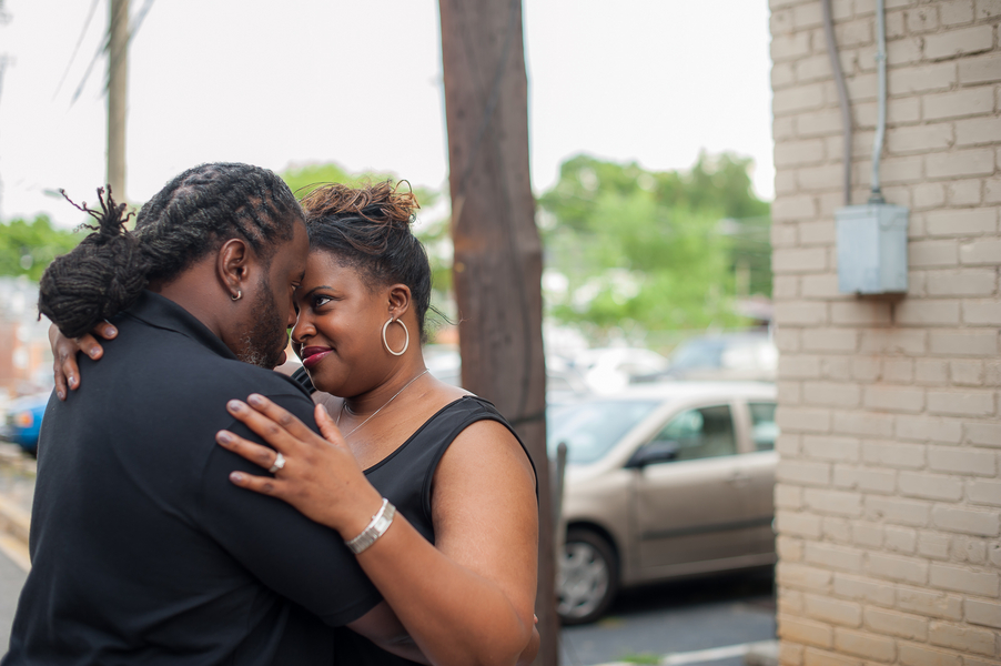 Urban Engagement Shoot In Small Downtown featuring a stunning curvy bride to be