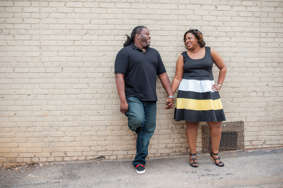 Urban Engagement Shoot In Small Downtown featuring a stunning curvy bride to be