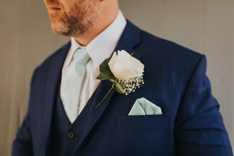 White Rose Buttonhole Mint Tie Groom Creative Festival Wedding 