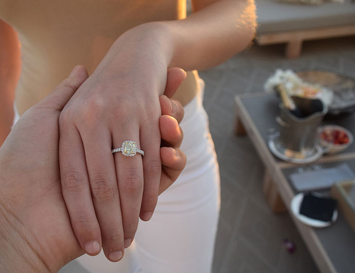 yellow-diamond-engagement-ring-on-customer
